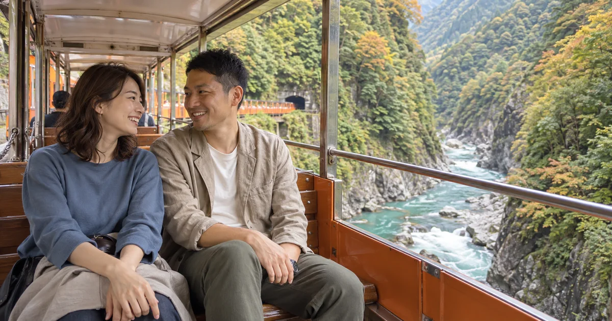 黒部峡谷トロッコ列車でデートを楽しむふたりをイメージしたAI画像